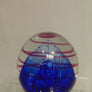 Handmade glass limited edition Evolution paperweight