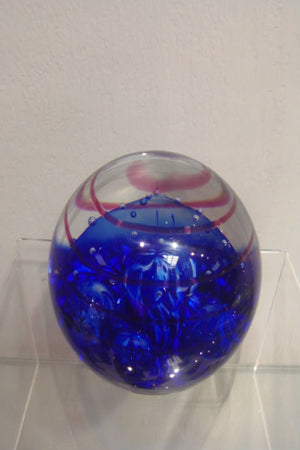 Handmade glass limited edition Evolution paperweight